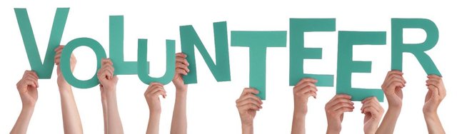 Many-Hands-Holding-the-red-Letters-Volunteer-Isolated-1024x300.jpg