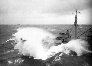 300px-Oil_tanker_trying_to_move_into_refueling_position_during_Typhoon_Cobra.jpg
