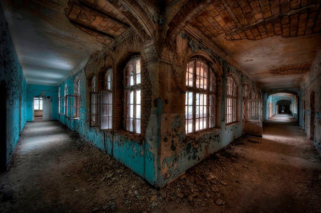 Blue Split - Split corner shot of a beautiful blue decayed corridor in this former sanatorium - Niki Feijen.jpg