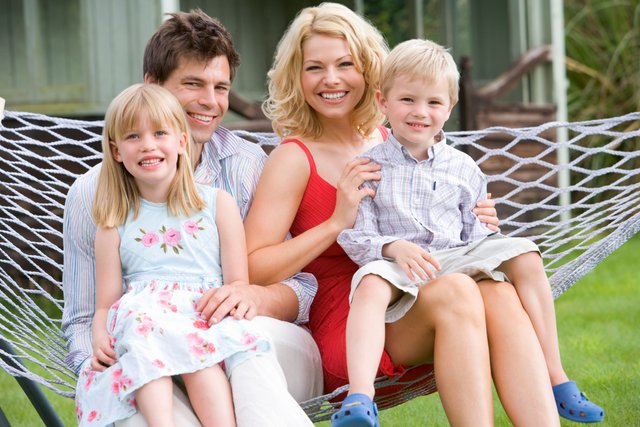 family-sitting-in-hammock-smiling_rFFeNOjRri.jpg