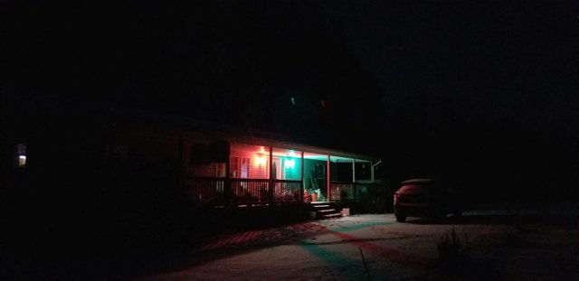 20180116_175145 - front of houseafter dark in snow.jpg