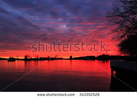 stock-photo-sunset-glow-over-river-with-blood-red-color-343352528.jpg