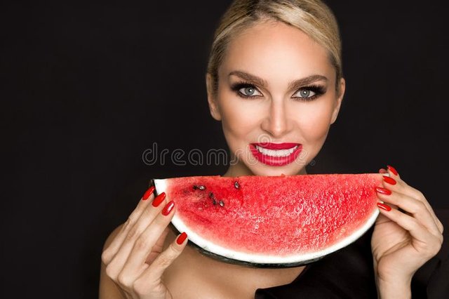 beautiful-female-model-perfect-face-smooth-skin-care-holding-eating-watermelon-fruit-beautiful-female-sexy-blonde-107770554.jpg