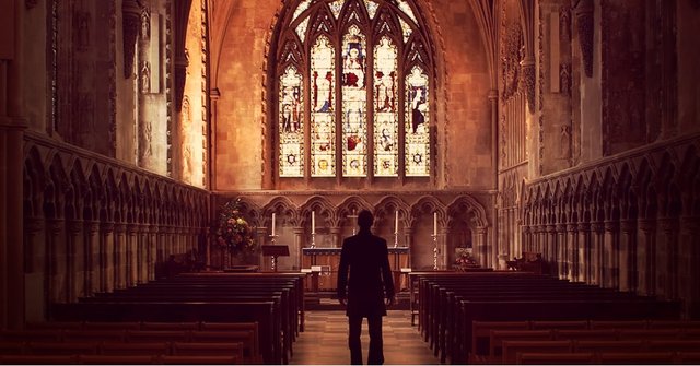 13063-man-standing-church-aisle-silhouette-pastor.1200w.tn.jpg