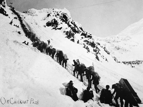 prospectors-climbing-the-chilkoot-pass-during-the-klondike-gold-rush.jpg