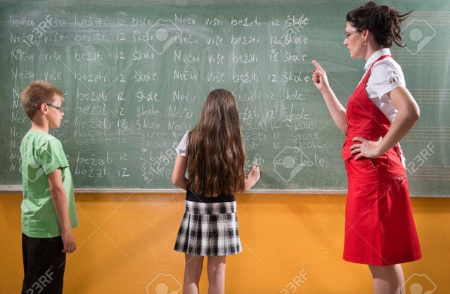 19563161femaletecherlookingtoherstudentswithsevereattitudeStockPhoto.jpg