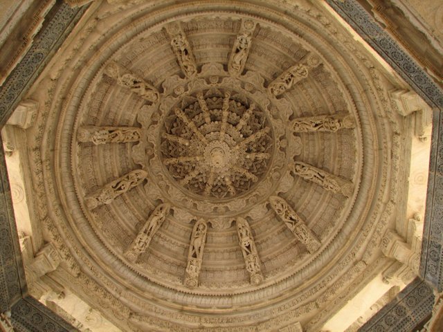India_-_Udaipur_-_041_-_beautifully_carved_ceiling_at_the_Ranakpur_Jain_Temple_(1059176705).jpg