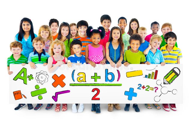 diverse-cheerful-children-holding-mathematical-symbols-44044077.jpg