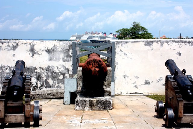 The Bahamas - Nassau - Guns at Fort Charlotte point towards the cruise ship terminal.jpg