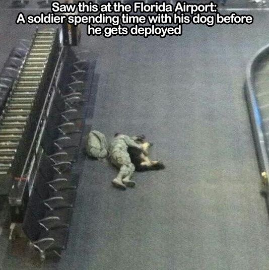 Soldier on the Floor with his dog.jpg