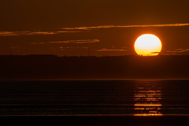 Orange Sunset Cefn Sidan - By Steve J Huggett.jpg