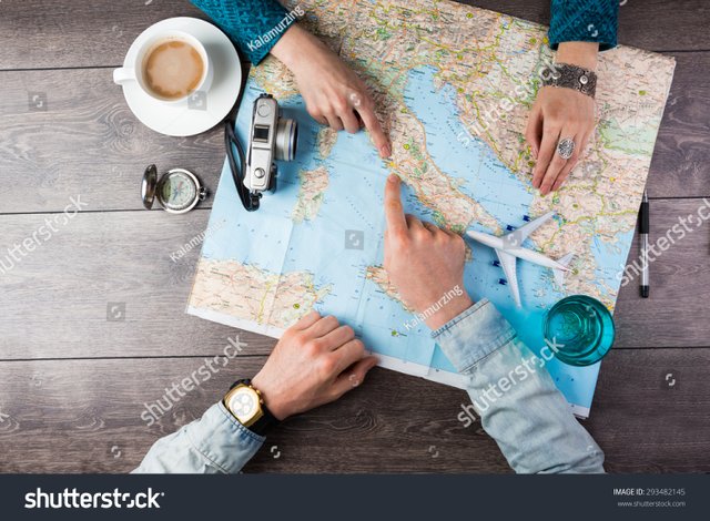 stock-photo-young-couple-planning-honeymoon-vacation-trip-with-map-top-view-pointing-to-europe-rome-293482145.jpg