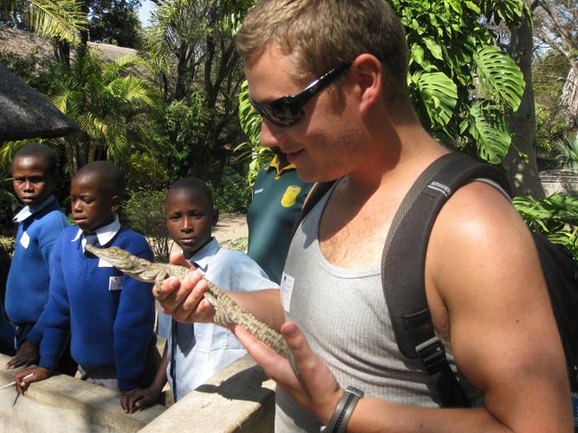 orjan holding a baby croc.JPG