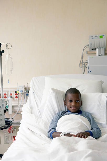 boy-in-a-hospital-bed-picture-id519927678.jpeg