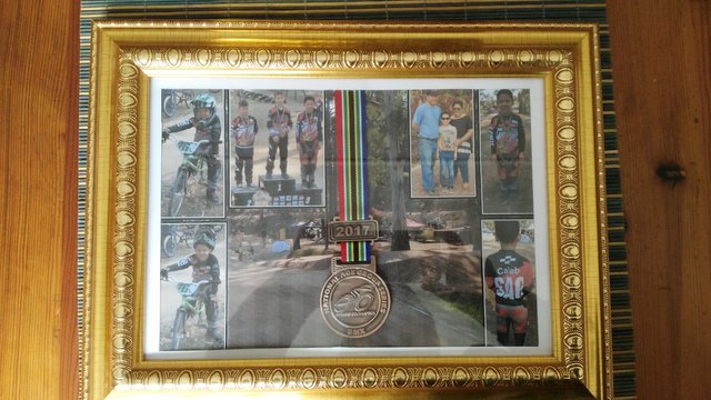 Caleb medal framed.jpg