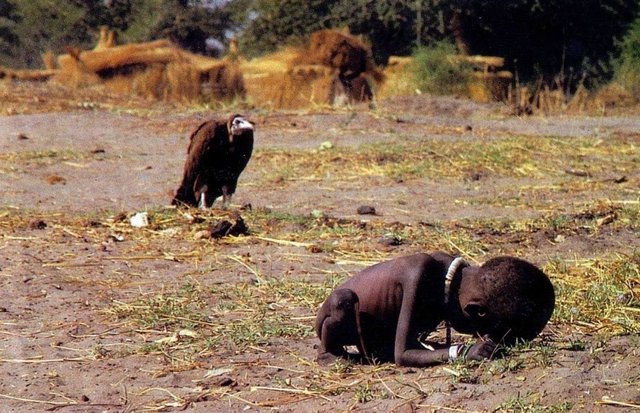 A hungry Somali child and a hungry tiger waiting for his death.JPG