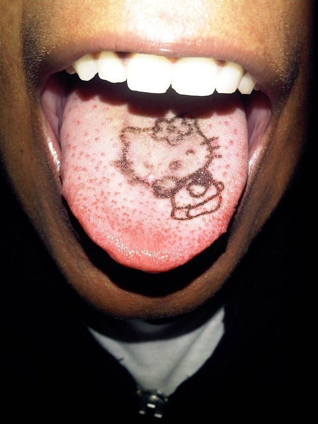 Black-Hello-Kitty-Tattoo-On-Tongue (1).jpg