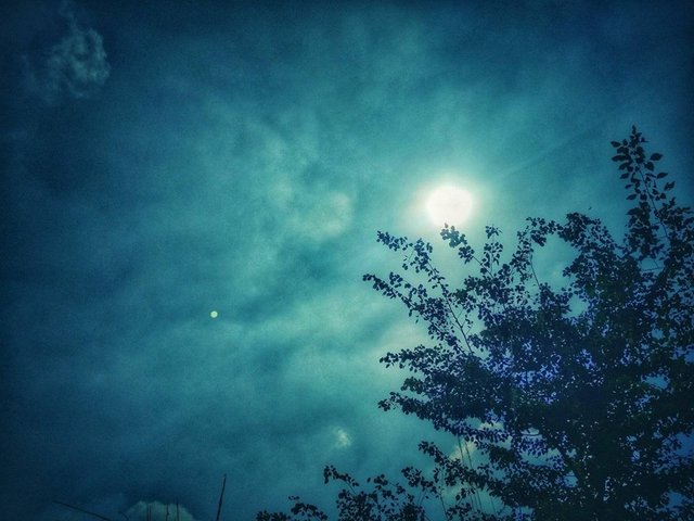 White Moon Covered By Dark Cloud mobile photography.jpg