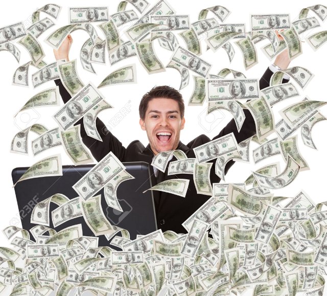 29176671-Portrait-of-successful-young-businessman-with-money-rain-Stock-Photo.jpg