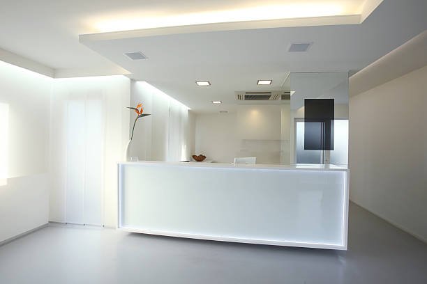 modern-reception-desk-in-grey-white-color-picture-id157441328.jpg