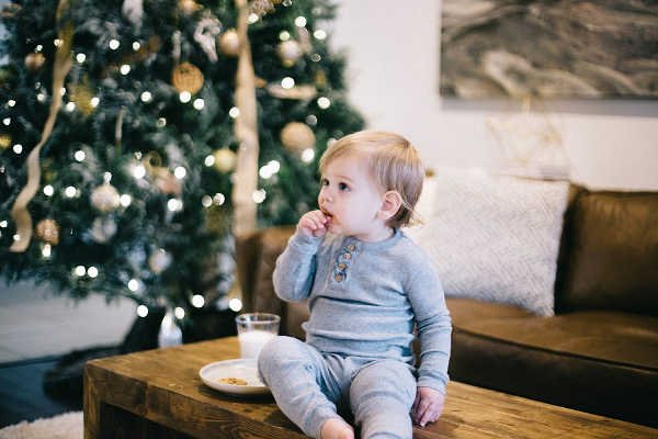 Baby on brown couch.jpg