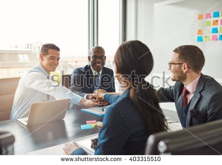 stock-photo-successful-multiracial-business-team-working-together-affirm-their-commitment-by-linking-hands-403315510.jpg