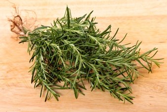 bunch-of-fresh-rosemary-on-wooden-board_1147-383.jpg