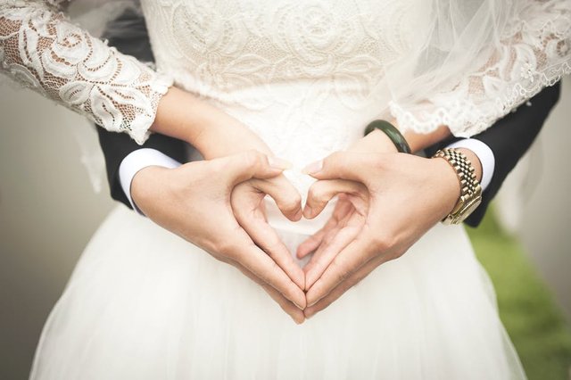 Husband AND Wife Make Double Heart with Hand.jpeg