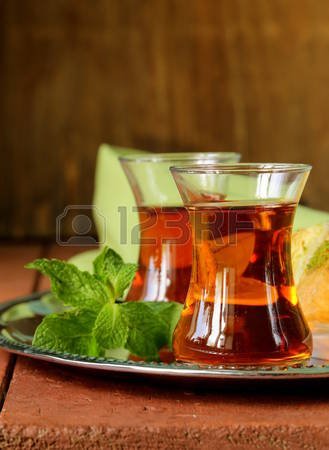 27910132-traditional-arabic-turkish-tea-served-with-fresh-mint.jpg