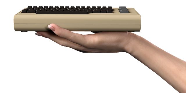 THEC64-Render6-hand-1024x512.png