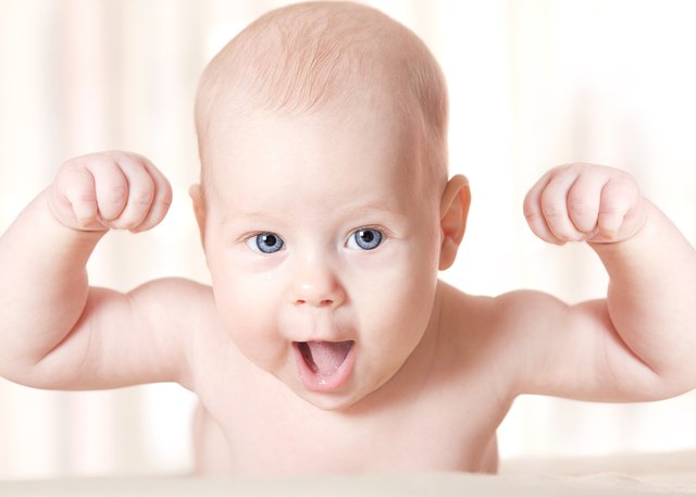 bigstock-Active-Baby-Raised-Hands-Up-An-23137367.jpg