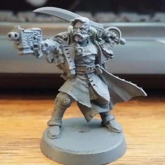 Plastic Commissar body spacewolf head and boltistol with falchion.jpg