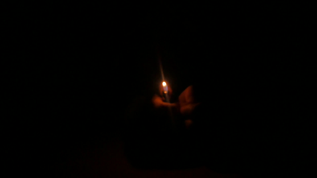 mens-hand-lights-a-cigarette-lighter-in-the-dark_h1gqrkyxfe_thumbnail-full01.png