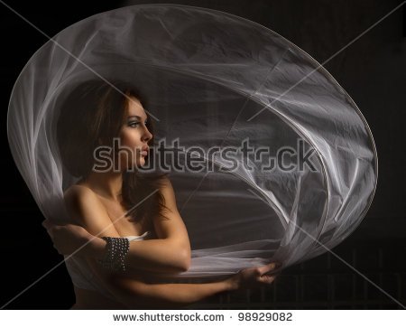 stock-photo-portrait-of-sexy-woman-with-white-petticoat-over-darkness-98929082.jpg