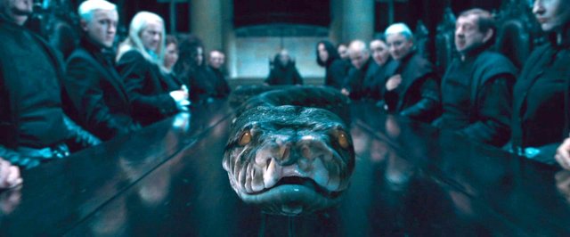 nagini_at_malfoy_manor_dining_table1.jpg