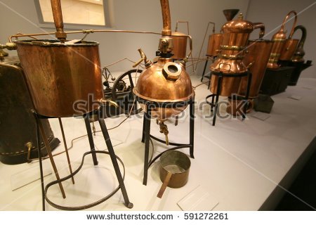stock-photo-distiller-for-the-production-of-perfume-water-the-copper-metal-vat-a-museum-piece-591272261.jpg