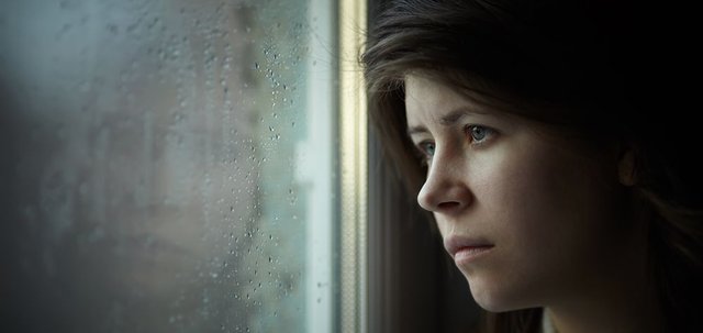 sad-woman-looking-out-window.jpg