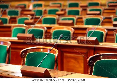 stock-photo-empty-vintage-congress-hall-with-seats-and-microphones-223257358.jpg