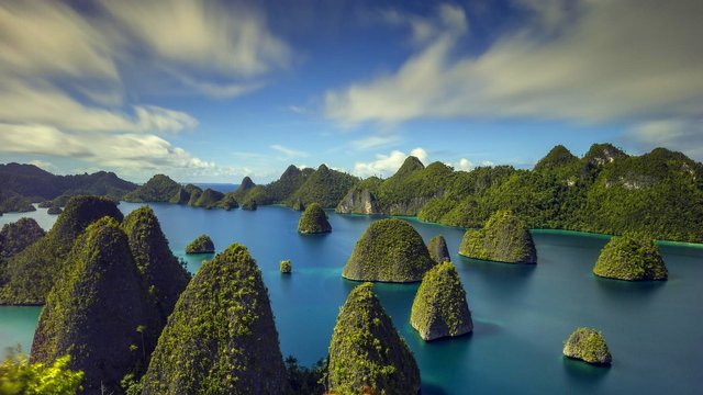 landscape-tropical-sea-rock-limestone-indonesia-clouds-summer-trees-nature-1920x1080.jpg