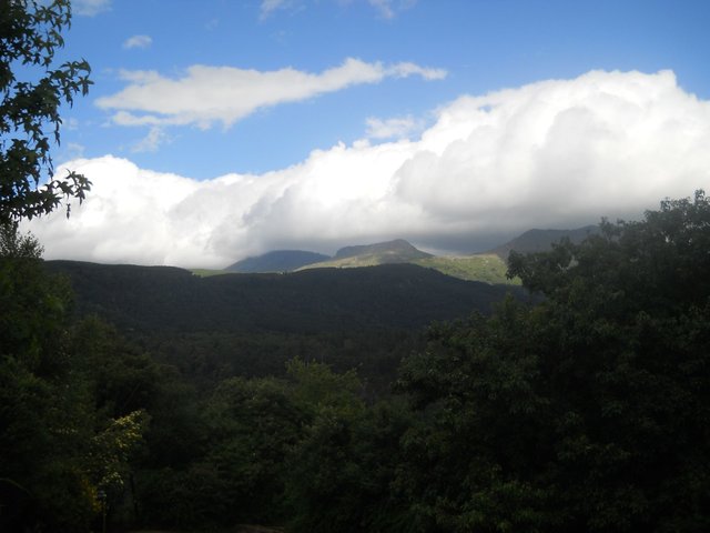 clouds and mountaintop in Hogsback.JPG