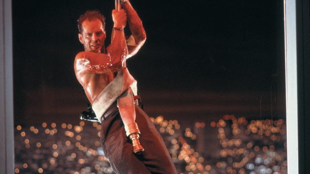 McClane-hanging-from-a-fire-hose-Die-Hard.jpg