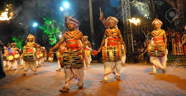 30630278-Kandyan-Drummer-Esala-Perahera-Stock-Photo.jpg