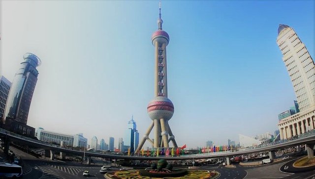 219008468-roundabout-traffic-oriental-pearl-tv-tower-pudong-architectural-icon.jpg