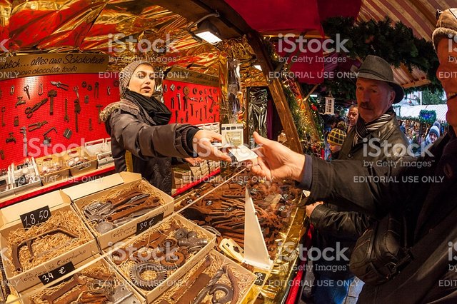 vendor-selling-unique-chocolate-tools-at-christmas-market-picture-id498954065.jpg