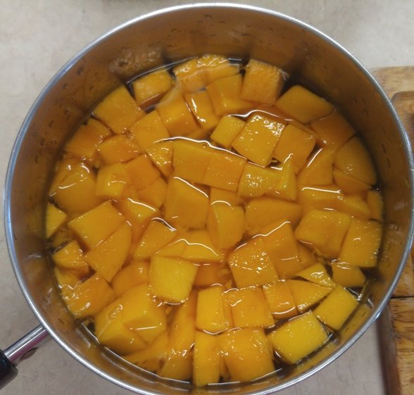 Mangos simmering in syrup.jpg