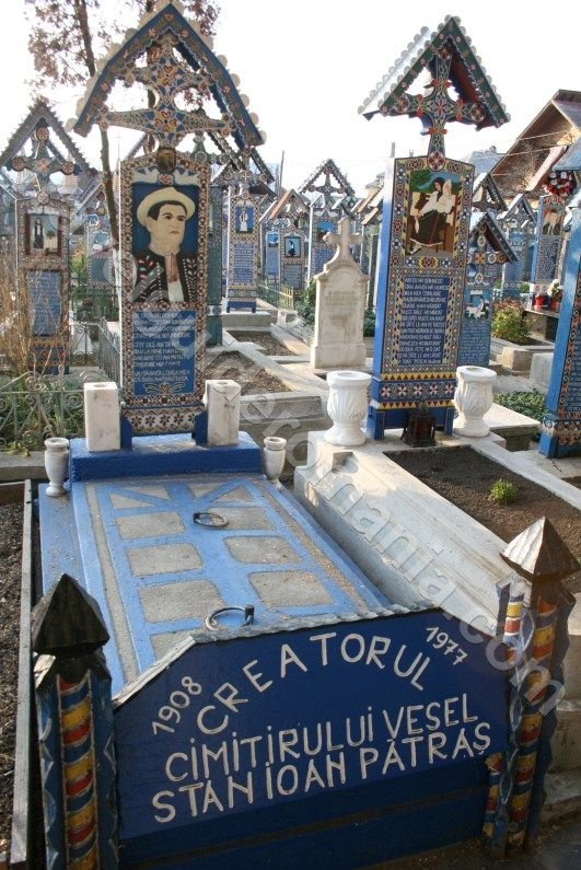 The-tomb-of-Ioan-Stan-Patras-creator-of-The-Merry-Cemetery-Romania.jpg