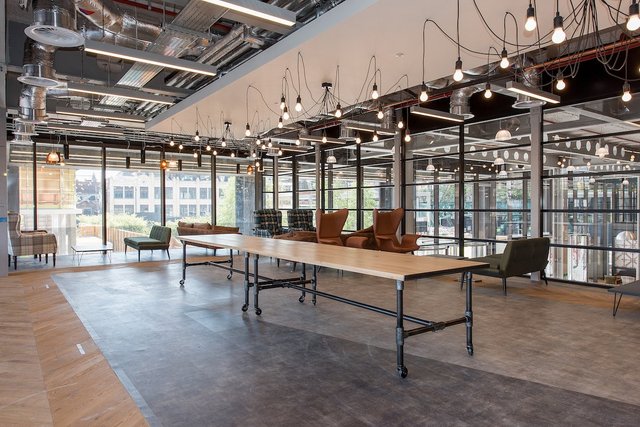 the-office-also-includes-adjustable-sittingstanding-desks-for-all-employees.jpg