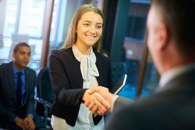 young-woman-shakes-hands-at-interview-599255630-589d261e3df78c4758bd6158.jpg