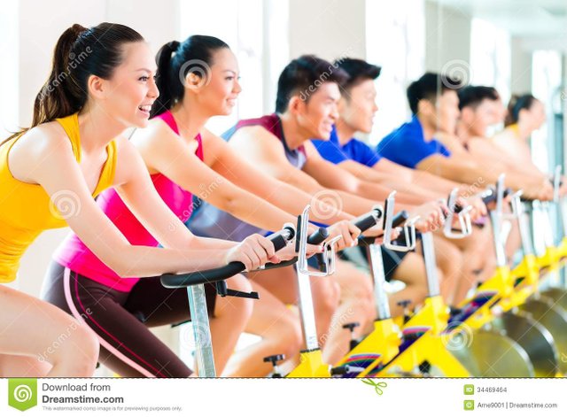 asian-people-spinning-bike-training-fitness-gym-chinese-sport-group-men-women-club-exercising-bikes-34469464.jpg