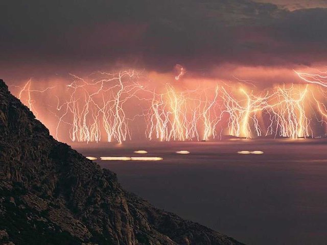 incredible-photo-montage-shows-the-greek-island-of-ikaria-being-pummeled-by-an-intense-lightning-storm.jpg